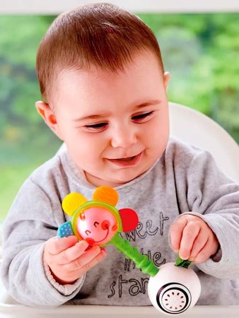 Hape Погремушка "Волшебное прикосновение" Светящийся Цветок