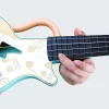 Музыкальная игрушка "Гавайская гитара" Рок-н-ролл Укулеле