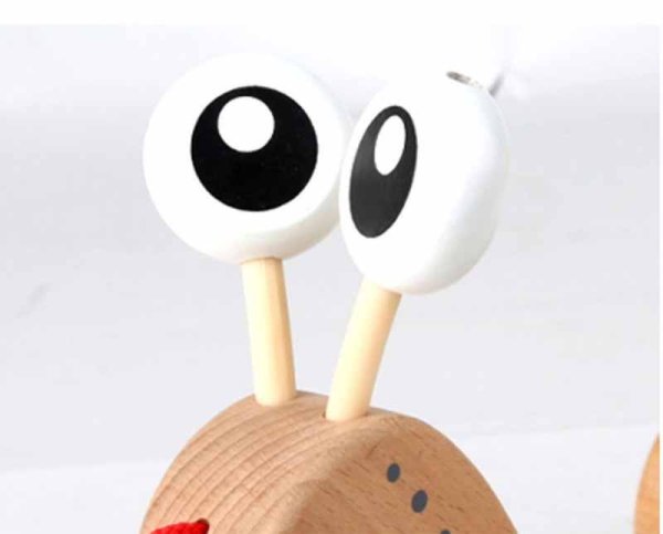 Hape Каталка-сортер "Улитка"