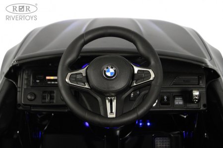 A555MP Электромобиль BMW M5 Competition (Черный глянец)